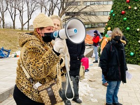 Alison Wood, of the Poverty and Housing Advocacy Coalition, speaks to the audience during a rally Friday, which was organized to get the attention of the provincial government. Organizers shared six demands, which they said will end the homelessness and overdose crises facing Greater Sudbury.