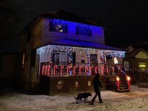 The house where Alex Trebek grew up in the Flour Mill glows with Christmas lights and decorations on a recent wintry night. Jim Moodie/Sudbury Star