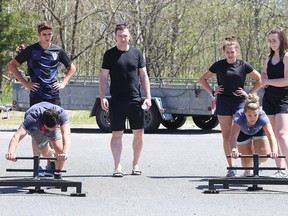 Brock McGillis runs fitness camp members through a drill in Sudbury, Ont. on Tuesday June 19, 2018. McGillis is working with Ontario Sport Network to launch to launch This is Your Sport campaign. Gino Donato