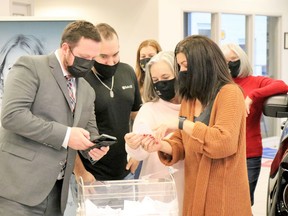 Lawyer Martin Riley, Joe Paquette, Lynn Paquette and Nicole Paquette read out the name of the winner of a new 2021 Ford Bronco on Dec. 11 for the Noelle's Gift's second annual Vehicle and Cash Draw. Carl Hnatyshyn/Sarnia This Week