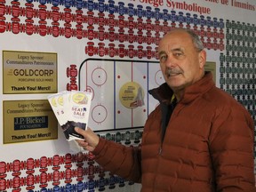 Wayne Bozzer, chairman of the Timmins Sports Heritage Hall of Fame, displays pamphlets for the organization's upcoming 2022 legacy fundraising campaign, a Symbolic Seat Sale of each of the 1,331 seats at the historic McIntyre Arena. The goal of the fundraiser is to establish and innovate a permanent hall of fame inside the arena.

ANDREW AUTIO/The Daily Press