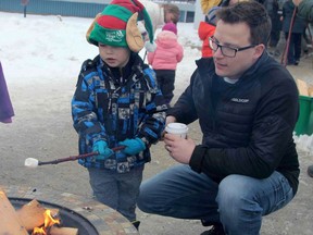 Kalan, who was four years old at the time this photo was taken, roasting marshmallows in the bonfire in front of the Timmins Museum along with his dad Paul Raymond during the Holiday Fun Day held Saturday, Dec. 1, 2018. The event, hosted by Downtown Timmins Business Improvement Association, returns this Saturday.

RON GRECH/The Daily Press