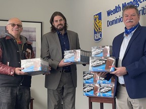 Faught Wealth Management of RBC Dominion Securities donated 100 boxes of ice cream bars to the Timmins food Bank in preparation for its Christmas dinner offerings. From left, is Jim Young of the Timmins Food Bank, Tom Faught Jr. and Tom Faught of Faught Wealth Management.

Supplied
