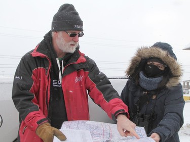 Mark Joron and Roxane Filion look on a map to discuss areas of Timmins where people were assigned to take part in the annual Christmas Bird Count Saturday. For a number of years, Joron has been the chief organizer of the event in Timmins. Filion was among more than a dozen participants.

RON GRECH/The Daily Press