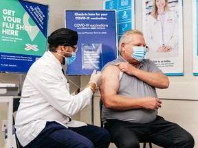 Premier Doug Ford is shown receiving his COVID-19 booster dose at an Etobicoke pharmacy joining millions of Ontarians who have received their third shot to combat the spread of the latest Omicron variant.

Postmedia Network