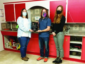 The Community Foundation of Lethbridge and Southwestern Alberta has provided a $15,000 grant to the Get-A-Way Youth Centre to renovate its kitchen. Pictured from left are Joan Petersen, executive director of Vulcan and Region Family and Community Support Services, Josh Cookson, program manager for the Get-A-Way Youth Centre, and Caitlin Gajdostik, grants coordinator for the Community Foundation of Lethbridge and Southwestern Alberta, in the youth centre's current kitchen.