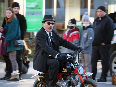 Members of the Shrine Club of Aylmer entertained the crowd by performing a few stunts on their tiny motorcycles at Sunday's Santa Claus Parade.
BRUCE URQUHART/SENTINEL-REVIEW