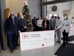 Representatives from West Elgin Mutual Insurance presented a $100,000 cheque to Hospice of Elgin representatives Dan Reith, Dr. Bob Jones and Carrie Ford towards building the new facility.