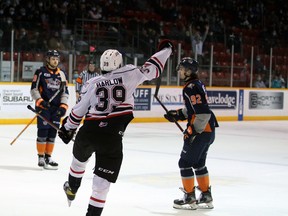 Rookie Colby Barlow celebrates his first period goal as the Owen Sound Attack host the Flint Firebirds inside the Harry Lumley Bayshore Community Centre Saturday, Dec. 4, 2021. Greg Cowan/The Sun Times