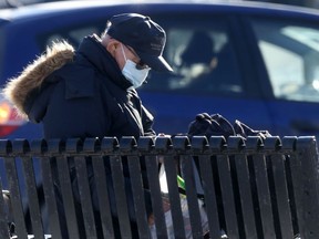 A person wears a mask while in public in Winnipeg on Friday Dec. 10. 2021.