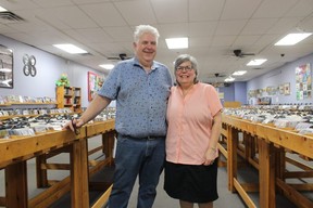Roland and Mary Anne Peloza stand inside Cheeky Monkey, the record, CD and DVD store they ran in downtown Sarnia for 22 years before retiring in 2021.