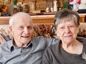 Marshall and Jennie Rolling celebrated their 70th wedding anniversary in August, 2021. They’re holding the original photo of their wedding day.