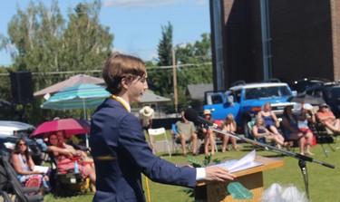 Valedictorian Caleb Evans speaks at St. Michael's June 26 convocation.