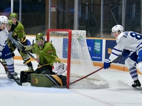 Goaltender Joe Vrbetic of the North Bay Battalion foils a scoring attempt by Ole Bjorgvik-Holm of the visiting Mississauga Steelheads in Ontario Hockey League action Thursday night. Mississauga's Ty Anselmini and the Troops' Anthony Romani and Cam Gauvreau clog the front of the net.
Tom Martineau Photo