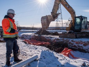 Feltz Design Build site supervisor Harold Holland oversees workers constructing a warehouse on Lorne Avenue East in Stratford. (Chris Montanini/Stratford Beacon Herald)