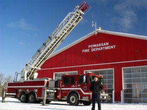 Powassan Fire Prevention Officer Ben Mousseau and 'Big Red,' the fire department's latest acquisition: a 42-foot long fire truck with a 105-foot ladder.
Rocco Frangione Photo