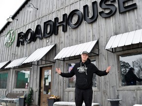 With new provincial restrictions closing in-person dining across Ontario, local restaurants are working to ensure they can survive through the hit to their businesses. Pictured is Matt Long of MJ’s Roadhouse in Lucan, which has shifted to a reduced set of hours and is serving only takeout options. Dan Rolph