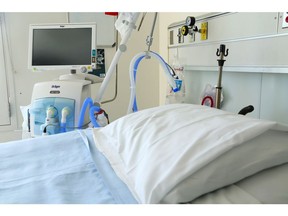 A ventilator stands beside a bed in the regional intensive care unit at Belleville General Hospital in Belleville.