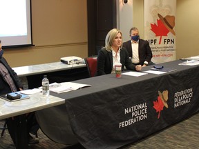 L-R: Jeff McGowan, Michelle Boutin and Kevin Halwa of the NPF speak during the "Keep Alberta RCMP" tour's stop in Fort McMurray on January 11, 2021. Jenna Hamilton/Fort McMurray Today/Postmedia Network