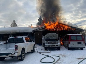 A rural Strathcona County family lost their home to a fire on Tuesday, Jan. 11. A man was also sent to hospital with second-degree burns and two family pets died. Photo courtesy SCES