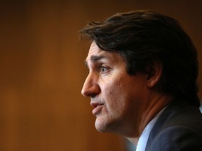 Maybe Prime Minister Justin Trudeau can find legacy enough in achievements, such as handling the COVID challenge, ‘rope-a-doping’ former U.S. president Donald Trump for four years, legalizing pot and medically assisted death, handing provinces the money for cheap child care and enshrining gender balance in cabinet, writes Tom Mills. Photo by DAVE CHAN/AFP via Getty Images)