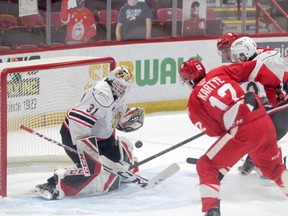 Soo Greyhounds forward Tye Kartye takes a shot on Owen Sound Attack goaltender Nick Chenard during Saturday night's 5-2 win over the Attack. Kartye scored a short-handed goal on Sunday afternoon as the Hounds earned a 6-1 win over the Attack.