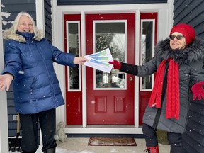 The $2,100 in donations made following the annual Vigil Against Violence Against Women in Port Elgin Dec. 6 will be equally shared among three Grey Bruce women's support organizations. Sylvia Sheard (left), chair of the vigil for the Canadian Federation of University Women, Southport and president, Sandi Primeau, will mail the cheques as in-person presentations are not possible due to the pandemic. [Supplied]