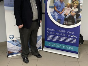 Campbellford Memorial Hospital's interim president and CEO, Eric Hanna, stands next to a hospital foundation banner Tuesday at the hospital.