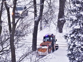 Monday's blizzard set a new single-day precipitation record in Quinte, reported Environment Canada, with 32.4 centimetres of snowfall or roughly 13 inches of precipitation. DEREK BALDWIN