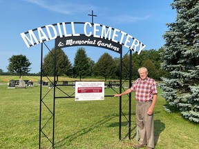 On May 6, 2001, two new cemetery sites were opened in Caradoc Township.
Ron Madill stands in front of Madill Cemetery, named to recognize his role in their development over a 10-year period. Paul Long photo