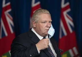 Ontario Premier Doug Ford arrives to his press conference at Queens Park in Toronto on Thursday to outline the easing of restrictions across the province associated with the COVID-19 pandemic.

THE CANADIAN PRESS/Nathan Denette