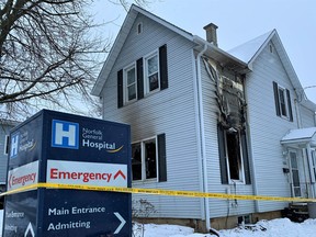 Norfolk OPP report a fatality in connection with a fire at this home in Simcoe early Sunday morning at the intersection of Queen Street South and Robinson Street. – Monte Sonnenberg