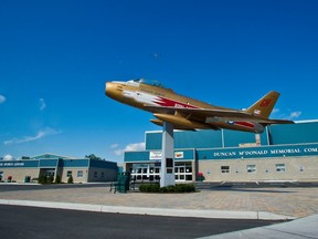 A statue of an jet emblazoned with the colours and name of the Trenton Golden Hawks stands in-front of the Duncan McDonald Memorial Community Gardens arena in Quinte West. File photo