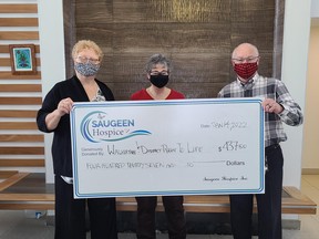 L-R: Linda Freiburger and Jean Hedley of the Walkerton Right to Life, and Carl Kuhnke, Chair of Saugeen Hospice Inc. at a cheque presentation on Friday, January 14. SUBMITTED
