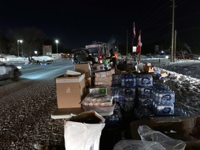 Disappointed volunteers pack up donations of food water, windshield washer fluid, dog treats after the freedom rally convoy did not go through Pinewood Park as planned. Organizers were extremely disappointed as they were more than 6000 people here ready to greet the truckers.
Jennifer Hamilton-McCharles