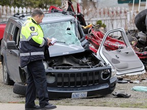 Sgt. Ray Magnan investigates a collision on St. George's Avenue near North Street in April 2017. JEFFREY OUGLER