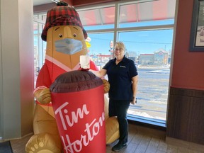 Leslie Farrell, a Woodstock Tim Hortons franchisee, shows off one of the Choose to Include donuts that local restauratns will be selling as part of a three-day fundraiser to support Special Olympics Canada. (MARIA TOEWS/SENTINEL-REVIEW)