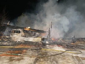 An early morning fire took place at a rural acreage located near Range Road 223 and Township Road 510 on Friday, Jan. 28. Fire crews were able to contain the fire to two buildings and had the blaze under control within an hour, however, there were $250,000 in damages caused. Photo courtesy SCES