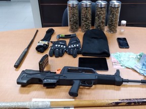 A 26-year-old Saugeen Shores man faces 16 charges after Grey Bruce OPP found a loaded firearm, suspected fentanyl, and a quantity of cannabis during a RIDE spot check on Highway 21 in Grey County. [Grey Bruce OPP]