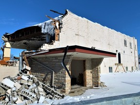 The former Delhi Belgian Hall on James Street is coming down brick by brick, with the demolition beginning at the rear of the sprawling, 30,000-square-foot property. This view from William Street shows the entrance to the former downstairs lounge known as the Shield and Friends Bar and Games Room. – Monte Sonnenberg