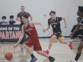 The St. Peter the Apostle Spartans seniors boys basketball team is currently ranked sixth in the province for 3A basketball. Photo by Sean McKennitt.