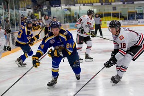 Fort McMurray defenceman Lucas Jones  chases after the puck in their game against the Whitecourt Wolverines on Wednesday, January 5, 2022. Photo by Dan Lines