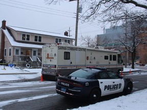 Police vehicles are shown in this file photo outside an address on Watson Street in Sarnia were a body was found Dec. 28.