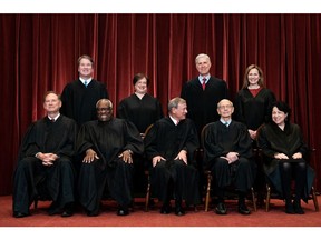 Members of the U.S. Supreme Court are, seated from left: Associate Justice Samuel Alito, Associate Justice Clarence Thomas, Chief Justice John Roberts, Associate Justice Stephen Breyer and Associate Justice Sonia Sotomayor. Standing from left: Associate Justice Brett Kavanaugh, Associate Justice Elena Kagan, Associate Justice Neil Gorsuch and Associate Justice Amy Coney Barrett.