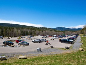 The large parking lot at the West Bragg Creek trail head was photographed on Tuesday, May 18, 2021. The new parking lot opened in 2019 to help deal with overcrowded parking in the popular area. The pandemic has meant even with the expanded parking the lot can be full early in the day on weekends both winter and summer.