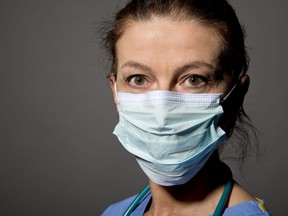 A health-care worker wearing a mask. (file photo)