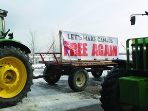 Janelle Huizinga recently sent us this picture of Niagara farmers showing their support for the trucker convoy by driving along a QEW service road. (Submitted photo)