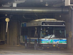 A bus is parked inside a garage at the London Transit Commission bus depot at 450 Highbury Avenue in London, Ont. on Monday March 15, 2021. (Derek Ruttan/The London Free Press)