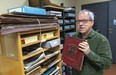A long-lost (and potentially very valuable) treasure, Wild Flowers of Canada by Elizabeth Keen White, has been discovered hidden in plain sight in the London Public Library's archives. "We’ve been on a high ever since" we found it, said London Room librarian Arthur McClelland. (Mike Hensen/The London Free Press)