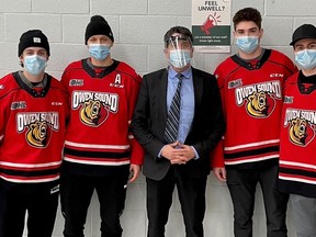 Owen Sound Attack hockey team members received their COVID booster shots from Dr. Ian Arra to encourage more people to get boosted. Left to right: Ethan Burroughs, Stepan Machacek, Dr. Ian Arra, Nick Chenard,  and Nolan Seed. (Supplied by Grey Bruce Health Unit)